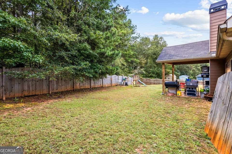 116 Coulter Woods Drive Locust Grove - 28