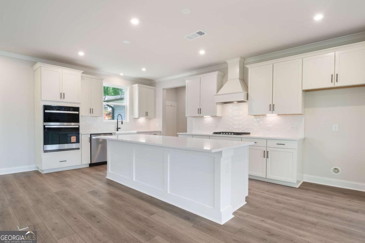 7515 Woolf Way Cumming - Photo 13