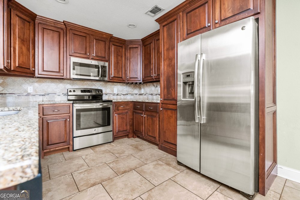 220 Summerstone Bend Byron - Photo 13