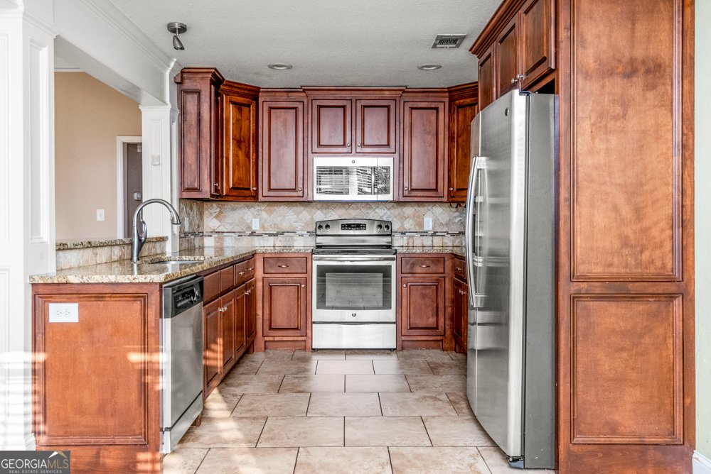 220 Summerstone Bend Byron - Photo 9