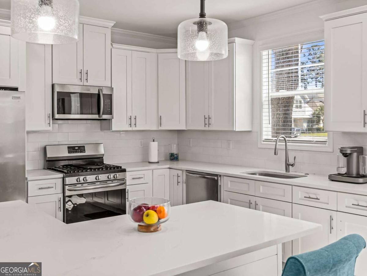 1038 Captain's Cove Way St. Simons - Photo 16