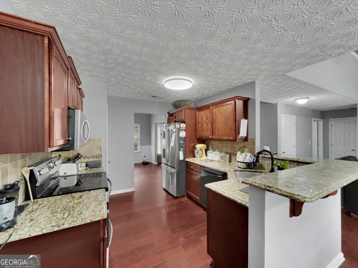 560 Windsong Lake Drive Commerce - Photo 16