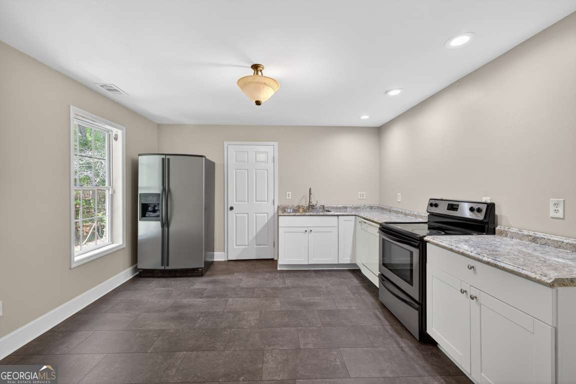 6085 Lake Windsor Parkway Buford - Photo 40