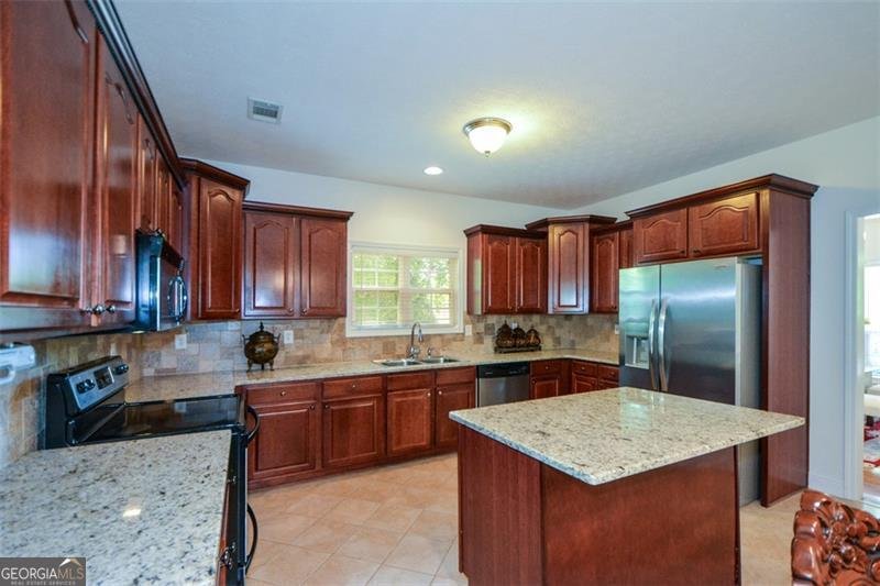 7052 Camp Falls Court Winston - Photo 10