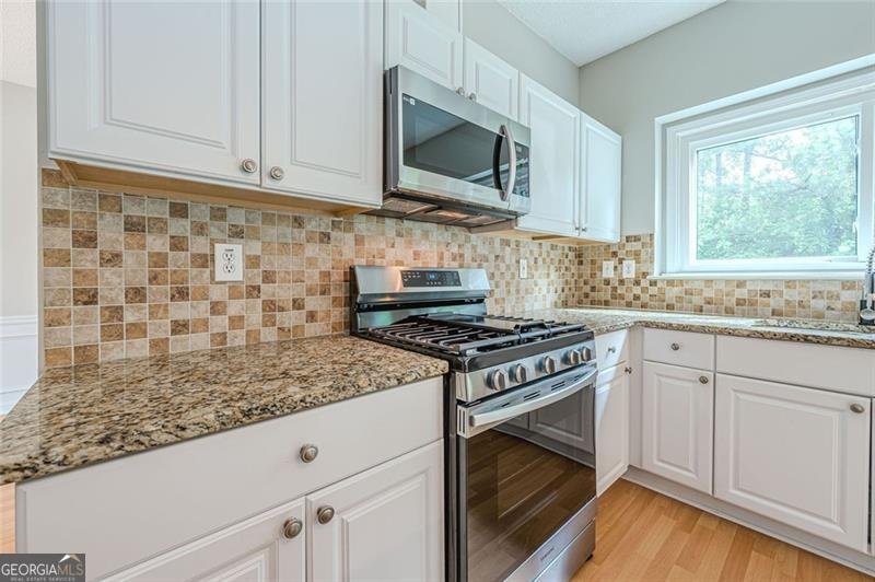 3647 Thornbrooke Place Duluth - Photo 14
