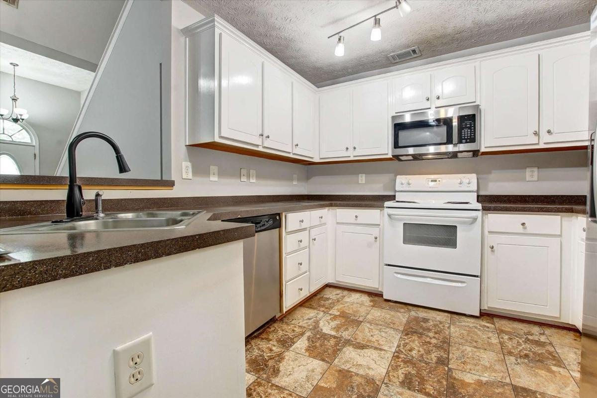 836 Freedom Walk Locust Grove - Photo 11