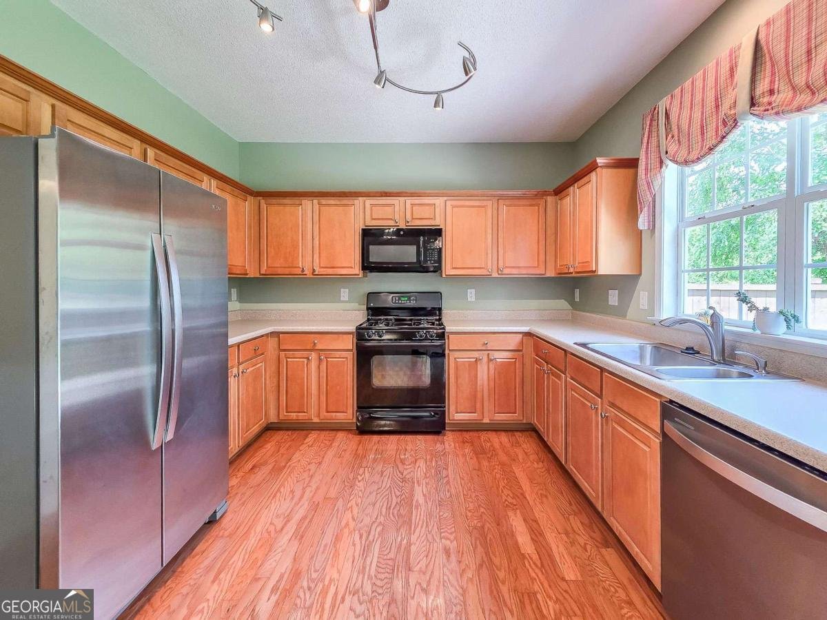 9025 Friarbridge Drive Suwanee - Photo 12