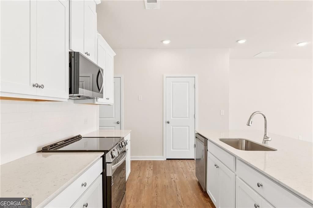 7485 Clover Lane Flowery Branch - Photo 10
