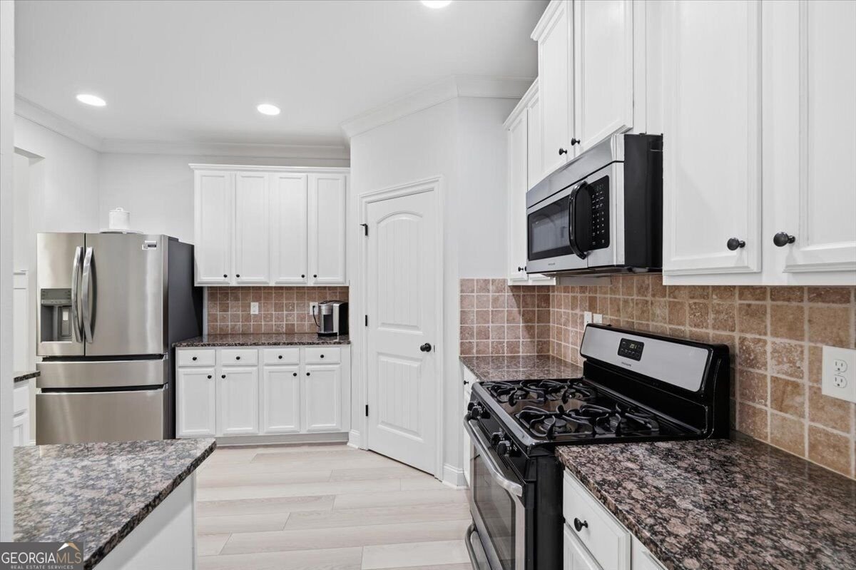 2449 Beauchamp Court Buford - Photo 28
