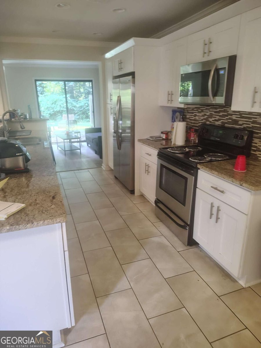6400 Hawthorne Terrace Peachtree Corners - Photo 6
