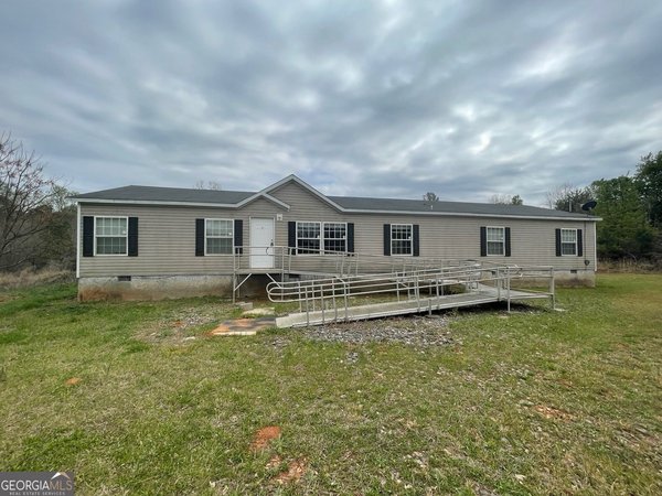 main picture of 884 Jackson Trail Road, Winder